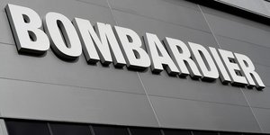 Bombardier, en perte au 2e trimestre, abaisse ses previsions